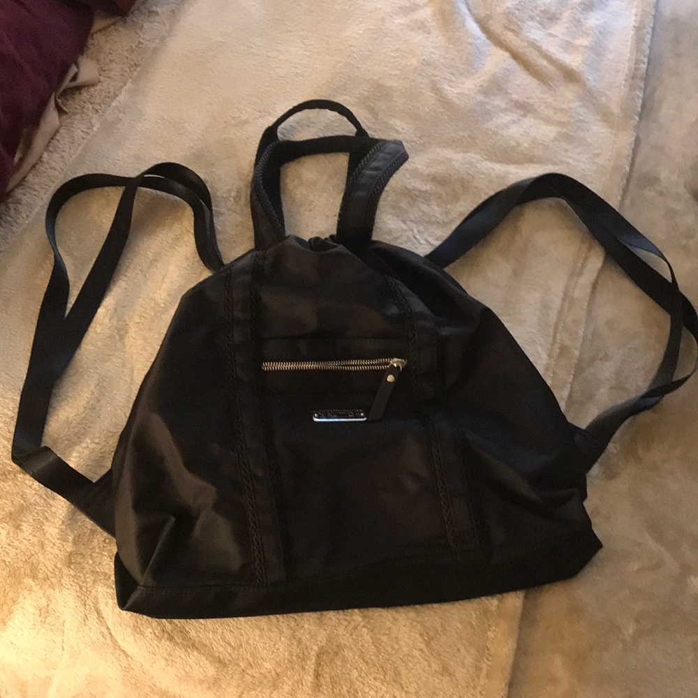 Like new backpack with tip handles